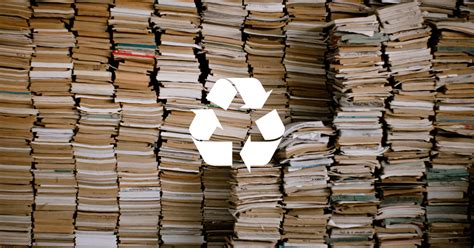 Green Bin Being Used To Collected Old And Used Books For Recycling