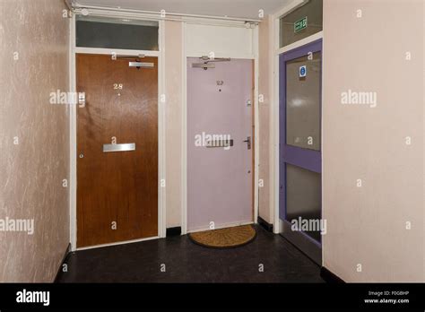 The Front Doors To Two Flats Inside A Council Run Residential Tower