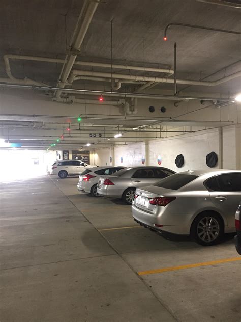 This Parking Garage Has Red Or Green Lights Above Each Parking Space To