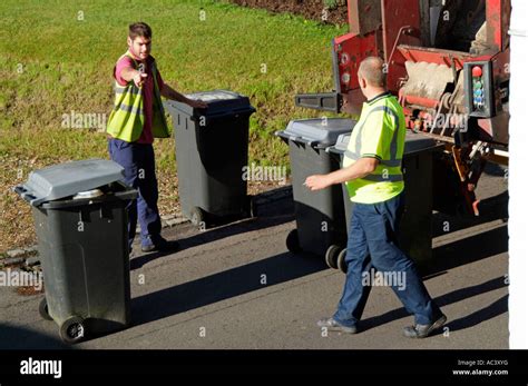 Wheelie Bin Serco Council Refuse Collection Bins Being Emptied Onto Dustcart Stock Photo Alamy